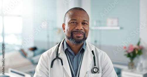 Healthcare, doctor and black man with arms crossed at hospital with smile for support, service and wellness. Medicine, professional and African expert with happiness and pride for career or surgery