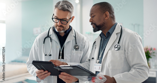 Doctors, men and tablet for team discussion, planning and advice with innovation, research or problem solving. Diversity, medical partnership and talk with notebook, digital touchscreen and report