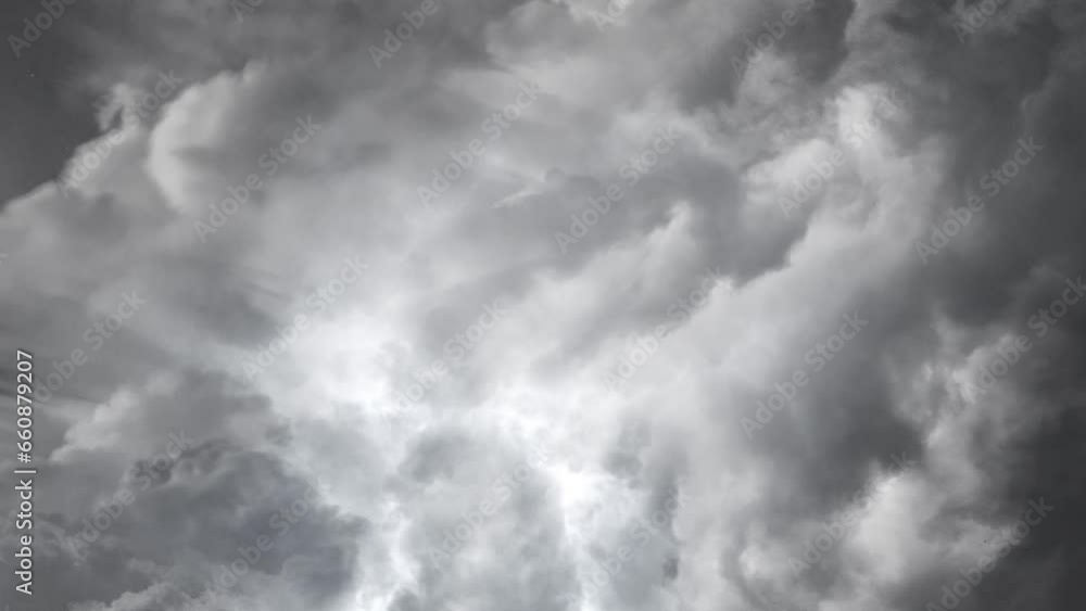 storm clouds and lightning bolts in white clouds storm clouds and lightning bolts in white clouds