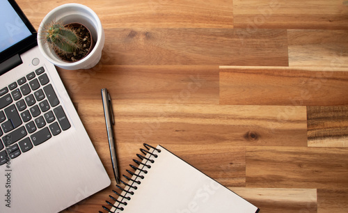 Top view of office tools on wooden table. Copyspace for the text. 