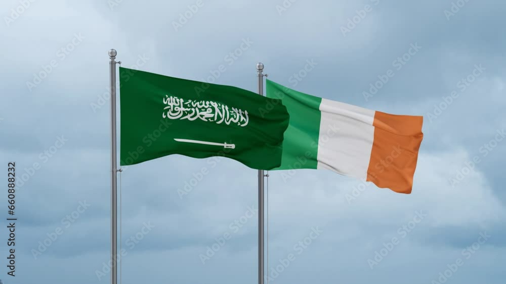 Ireland flag and Saudi Arabia flag waving together on cloudy sky, endless seamless loop, two country relations concept Ireland flag and Saudi Arabia flag waving together on cloudy sky, endless seamless loop, two country relations concept