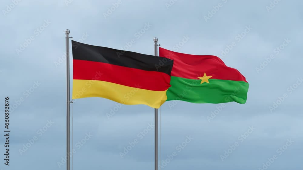 Burkina Faso flag and Germany flag waving together on cloudy sky, endless seamless loop, two country relations concept Burkina Faso flag and Germany flag waving together on cloudy sky, endless seamless loop, two country relations concept