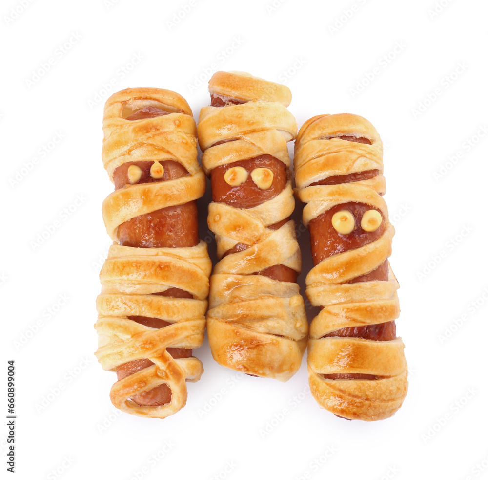 Cute sausage mummies isolated on white, top view. Halloween party food