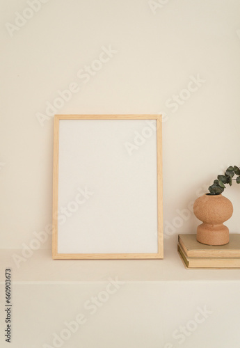 Wood Frame Mockup Neutral Interior Wall with Vintage Book and Plant Lifestyle Poster Mock Up