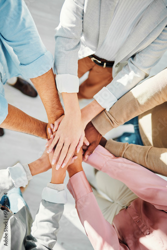 Teamwork, hands and support of business people in collaboration from above for integration, trust or winning. Closeup, partnership and team building for success, cooperation or achievement of synergy