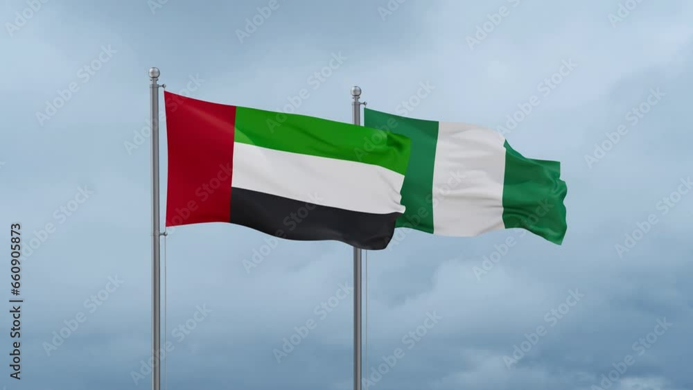 Nigeria flag and United Arab Emirates UAE flag waving together on cloudy sky, endless seamless loop, two country relations concept Nigeria flag and United Arab Emirates UAE flag waving together on cloudy sky, endless seamless loop, two country relations concept