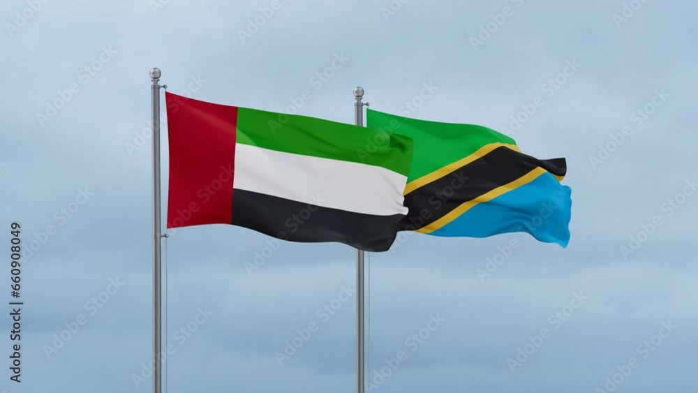 Tanzania and United Arab Emirates UAE flag waving together on cloudy sky, endless seamless loop, two country cooperation concept Tanzania and United Arab Emirates UAE flag waving together on cloudy sky, endless seamless loop, two country cooperation concept