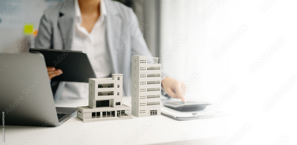 Considering buying a home, investing in real estate. Broker signs a sales agreement. agent, lease agreement, successful deal in office. Considering buying a home, investing in real estate. Broker signs a sales agreement. agent, lease agreement, successful deal in office.