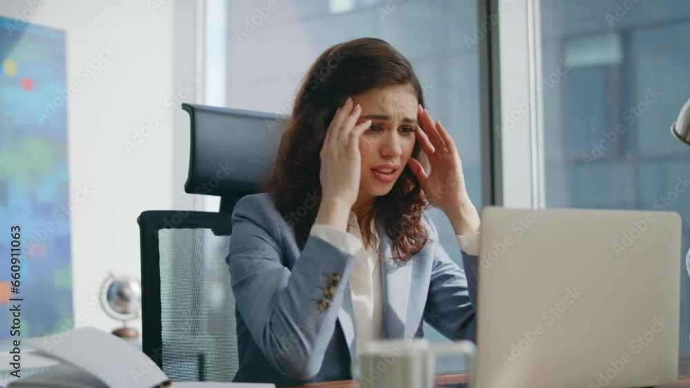 Desperate woman manager looking laptop shocked by business loss office close up. Desperate woman manager looking laptop shocked by business loss office close up.