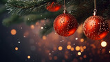 Merry Christmas ornaments. Red and Gold Christmas balls and lights Christmas tree with bokeh lights.