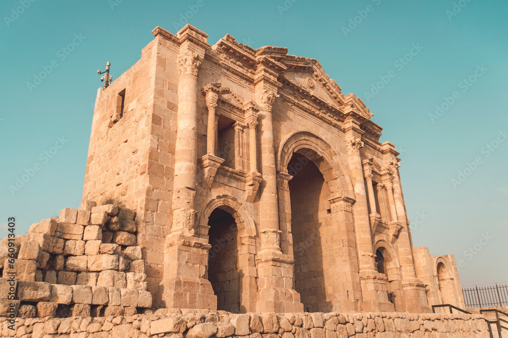 The Arch of Hadrian in Jerash, Jordan is an 11-metre high triple-arched gateway erected to honor the visit of Roman Emperor Hadrian to the city in the winter of 129-130. The Arch of Hadrian in Jerash, Jordan is an 11-metre high triple-arched gateway erected to honor the visit of Roman Emperor Hadrian to the city in the winter of 129-130.