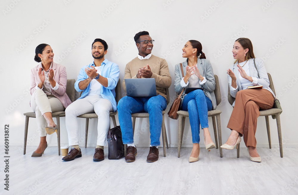 Obraz premium Business people, presentation and applause with smile in waiting room for interview, recruitment or we are hiring in a row. Men, women and group together for process, career and resume at company