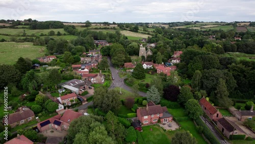 Aerial video footage of the remains of Bolingbroke Castle a 13th century hexagonal castle, birthplace of the future King Henry IV, with adjacent earthwork. and views of Old Bolinbroke Village. photo