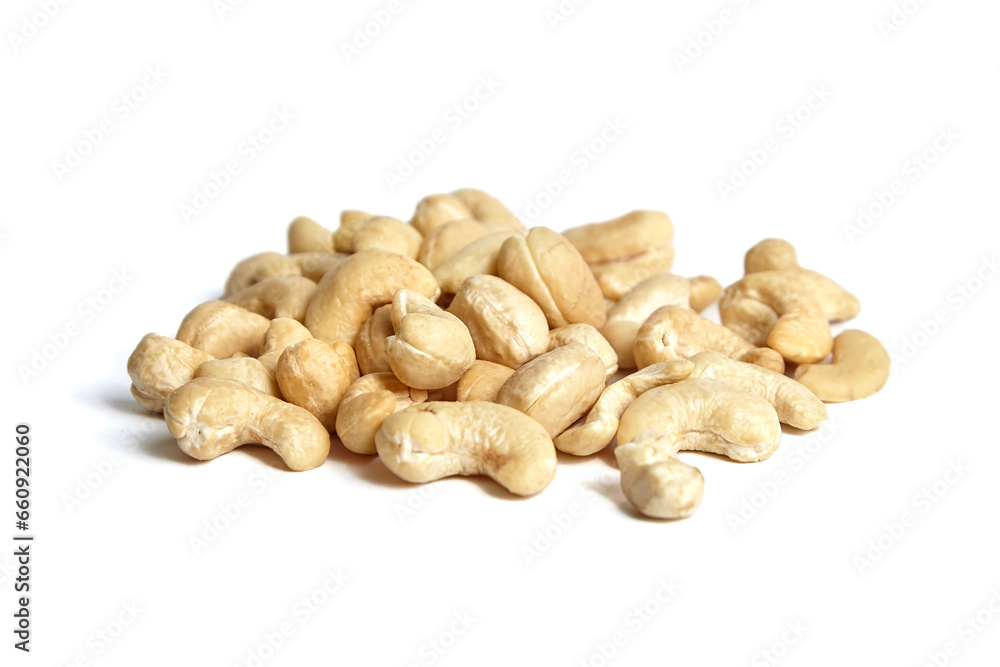 Cashew nut heap isolated on white background. Cashews, a popular snack Cashew nut heap isolated on white background. Cashews, a popular snack