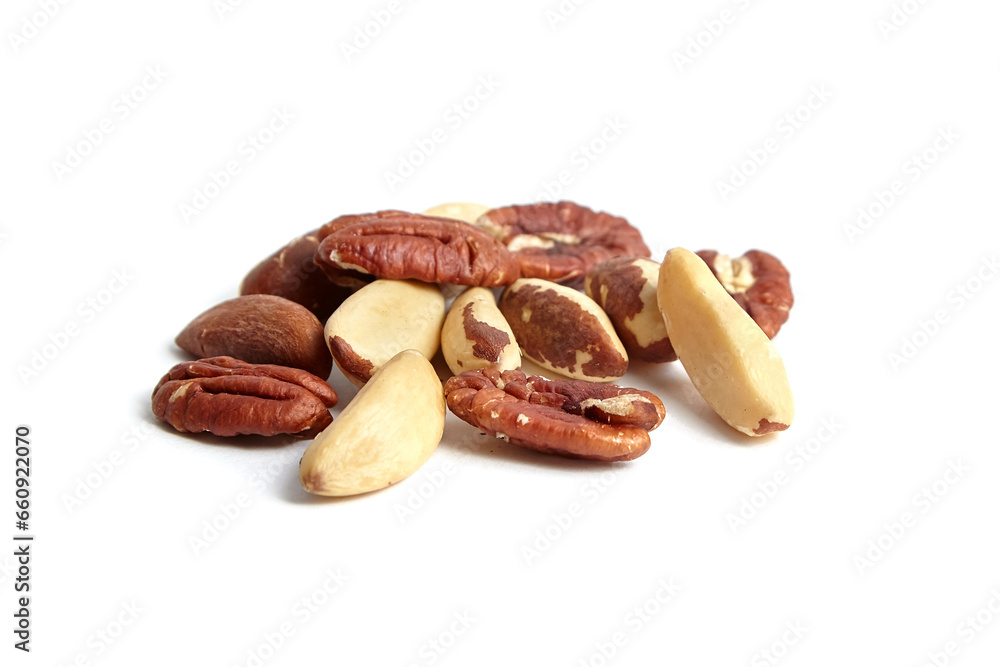Brazil nuts and peeled pecans mix isolated on white background. Nutty goodness Brazil nuts and peeled pecans mix isolated on white background. Nutty goodness