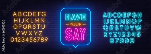 Have Your Say neon sign in the speech bubble on brick wall background.
