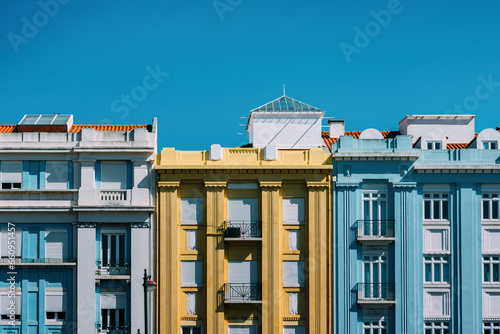 Colourful building facades in Campo Pequeno, Lisbon, Portugal on a sunny day
