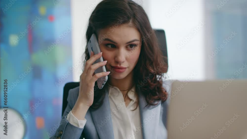 Smiling manager answer call sitting luxury office close up. Woman talking phone. Smiling manager answer call sitting luxury office close up. Woman talking phone.
