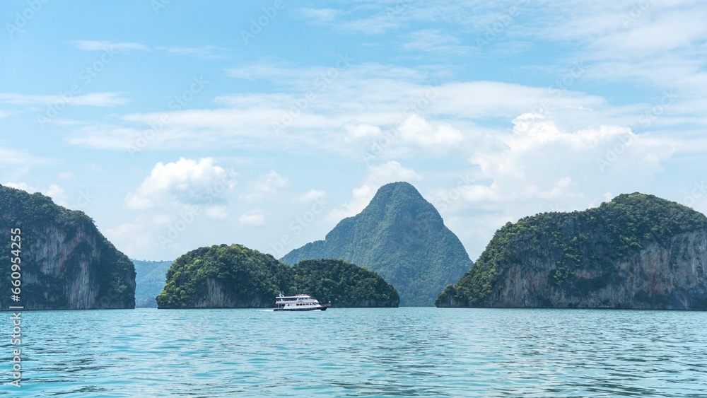 Scenic view of the sea and island mountains in Phang Nga Bay, Phuket, Thailand.
