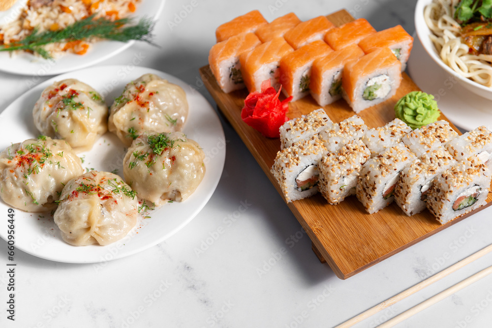 sushi rolls, manty, plov pilaf, oriental asian food banner sushi rolls, manty, plov pilaf, oriental asian food banner