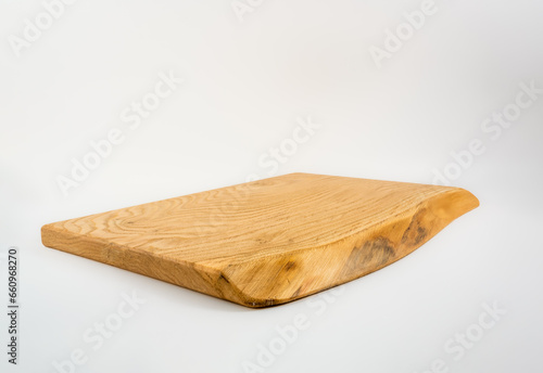 Live edge natural  hardwood rustic cutting chopping charcuterie or serving board isolated on a white background