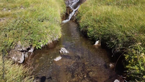 stream in the alpine praire taken from above by drone photo