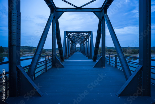 Europe Bridge Neuruednitz–Siekierki (Bienenwerder–Zaeckerick), 1892. Pedestrian (formerly railway) bridge across the Oder River, on the border of Poland and Germany. Opened after restoration in 2022. photo