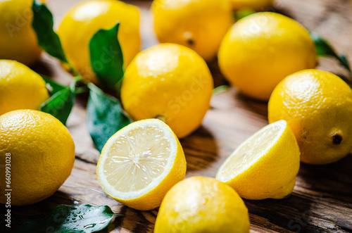 Fresh lemons. On wooden table.