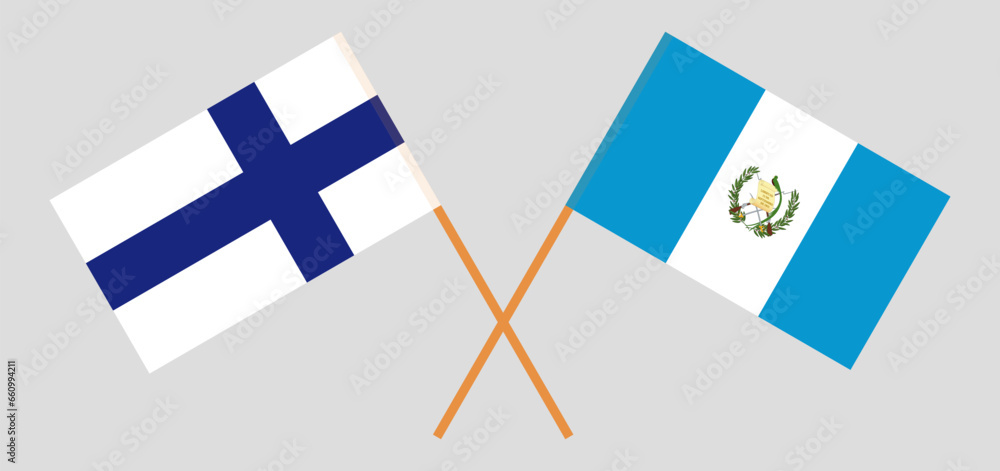 Crossed flags of Finland and Guatemala. Official colors. Correct proportion