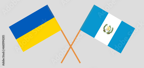 Crossed flags of Ukraine and Guatemala. Official colors. Correct proportion