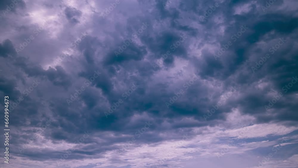 Clouds Moving In Blue Sky From Day To Dusk Transition Timelapse. Abstract Bold Blue Color. Natural Background Sky. Cloud Formation. Transition To Sunset Sky. Orange Sunset Sky Background. Dusk Time. Clouds Moving In Blue Sky From Day To Dusk Transition Timelapse. Abstract Bold Blue Color. Natural Background Sky. Cloud Formation. Transition To Sunset Sky. Orange Sunset Sky Background. Dusk Time.