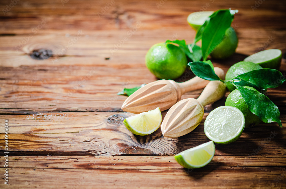 Fresh limes. On wooden table. Fresh limes. On wooden table.