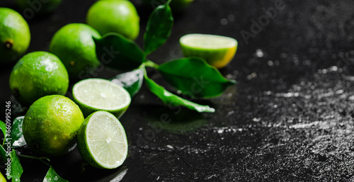 Fresh limes. On black table. © Artem Shadrin