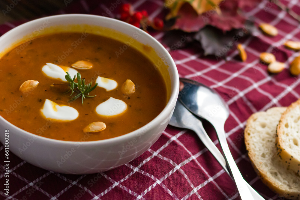 pumpkin soup. on a wooden background. gourmet. lunch .season pumpkin soup. on a wooden background. gourmet. lunch .season