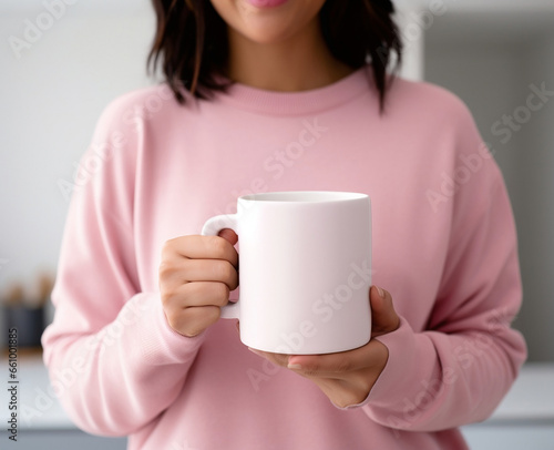 woman drinking coffee beautiful brunette women in pink sweater holding up