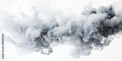 smoke billowing out of a pipe