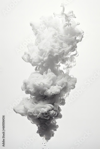smoke billowing out of a pipe in black and white