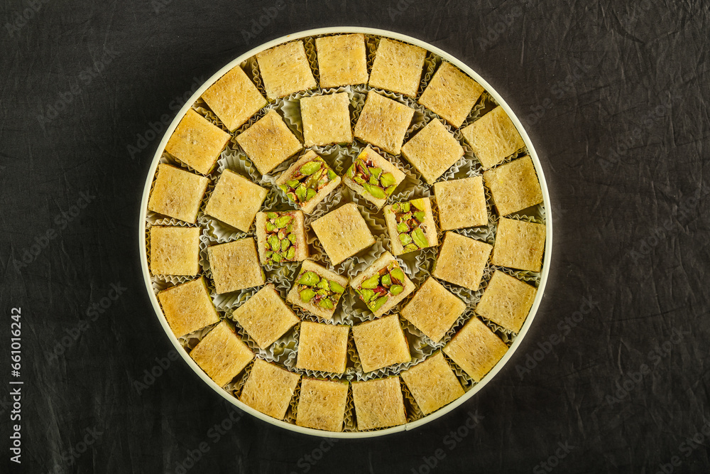 A box of assorted Arabic sweets with pistachios-3.jpg