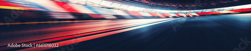 Dynamic blurred image of a fast-paced race track. photo