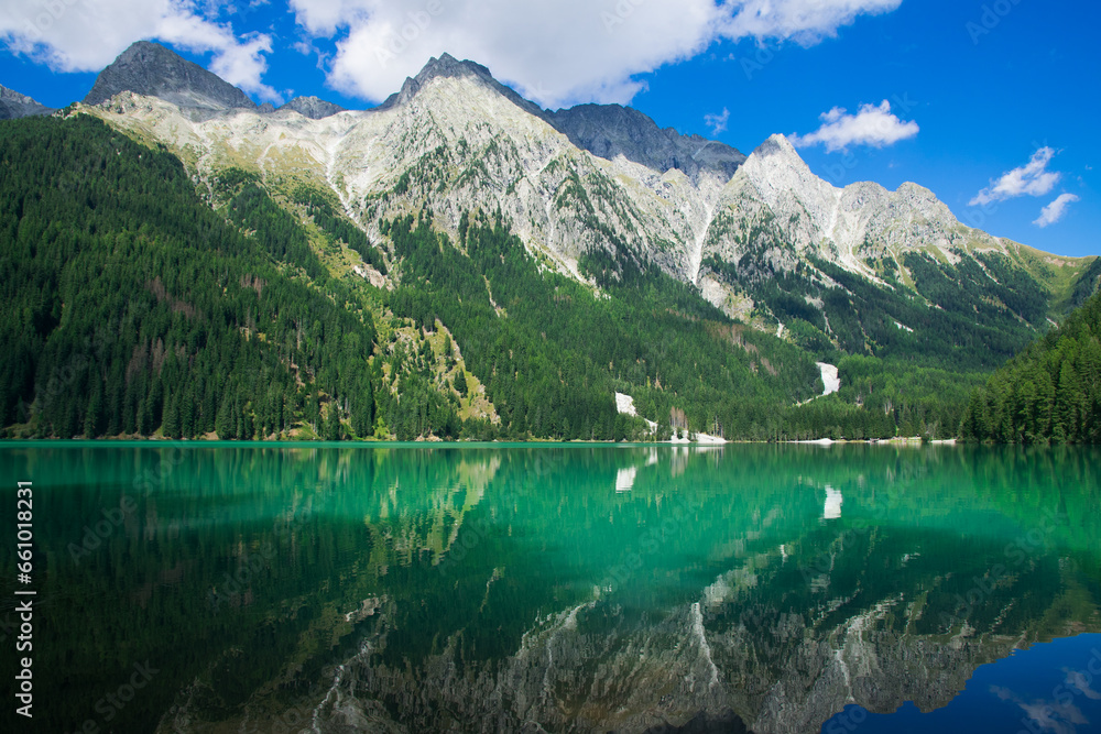 Magic landscape with peaceful alpine lake in Trentino Alto-Adige, Italy