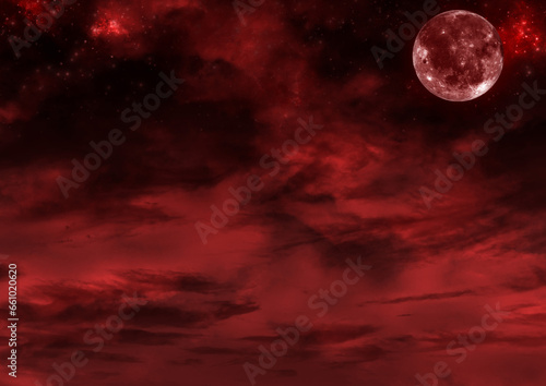 赤い明け方の星空と満月