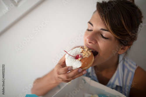Sweet Indulgence  Girl with Colorful Donuts