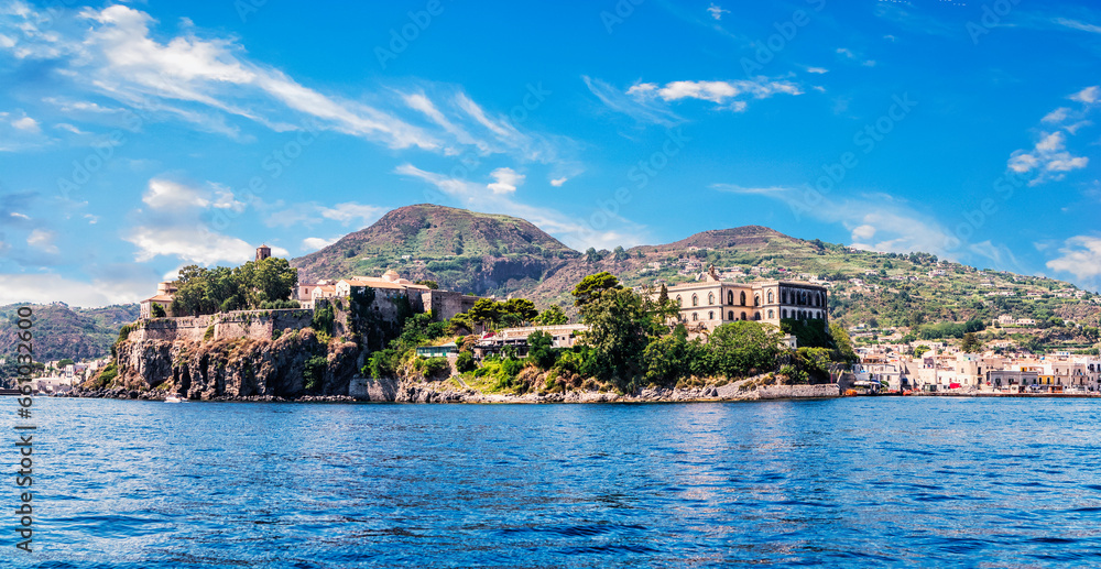 A small island in the middle of the Mediterranean Sea. Photo of a picturesque island surrounded by tranquil waters