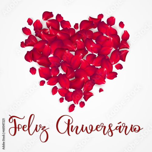 Cartão ou banner para desejar feliz aniversário em vermelho com um coração vermelho feito de pétalas acima em um fundo branco photo