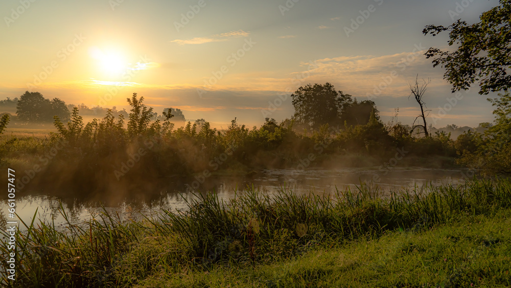 Morning fog at sunrise over the Suprasl River in Podlasie. Morning fog at sunrise over the Suprasl River in Podlasie.