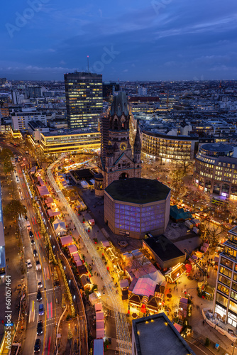 Elevated evening view of the City Center West skyline of Berlin  Germany  with Memorial Church and a christmas market during advent time