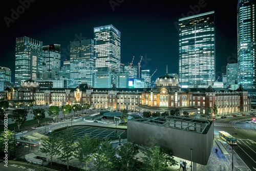 東京駅と高層ビル群の夜景（クール調） photo