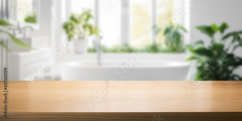 empty brown wooden tabletop for product display on blurred bright bathroom interior background