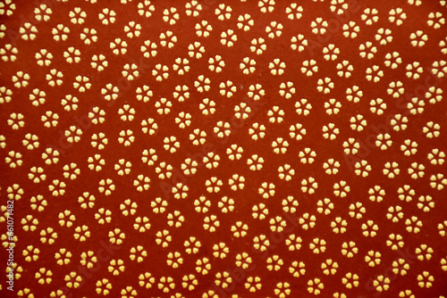 Inden is a unique traditional Japanese technique of painting the deer leather with lacquer urushi. Colourful typical design. photo