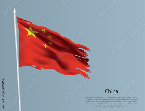 Ragged national flag of China. Wavy torn fabric on blue background